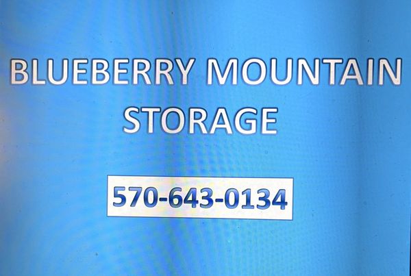 Sign for Blueberry Mountain Storage with phone number 570-643-0134.