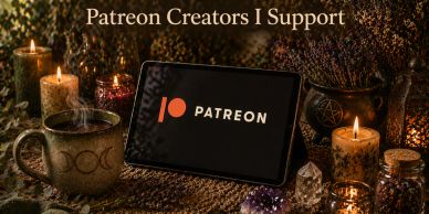 Tablet displaying Patreon logo surrounded by candles and crystals.