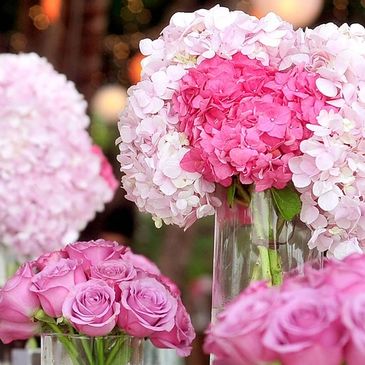 Pink hydrangeas and roses on table for wedding breakfast with UK Humanist Celebrant Susan Dobinson