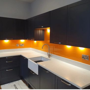 Orange custom made glass splash backs 