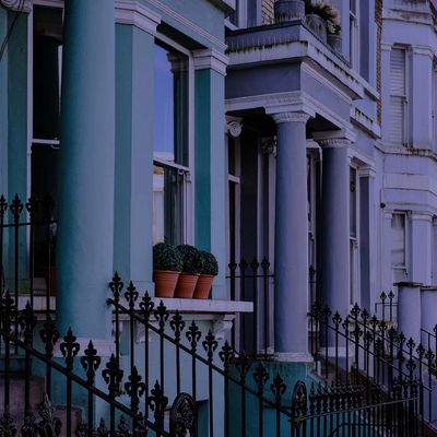 Mint green and pink terraced houses