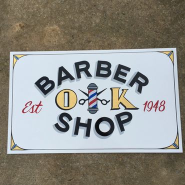 Gold leaf sign for a barber shop.