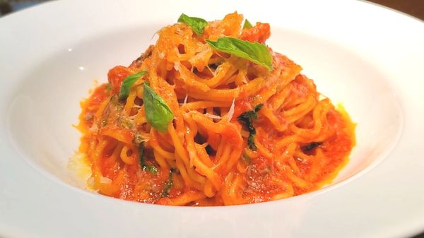 Spaghetti pomodoro with san marzano tomatoes a classic Italian pasta dish garlic basil parmesan