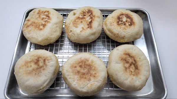Homemade slow fermentation English muffins.  Perfect for any breakfast, breakfast sandwich or burger