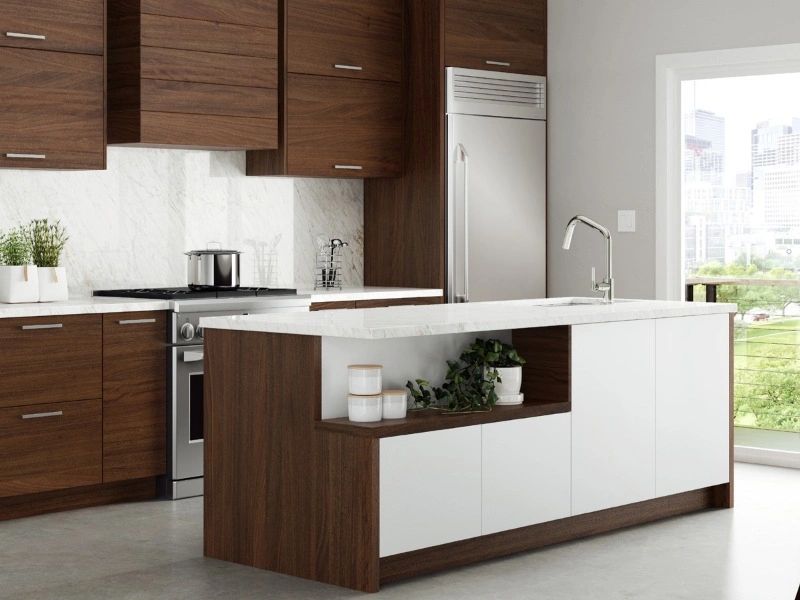 Modern kitchen with wood cabinets and white marble countertops.