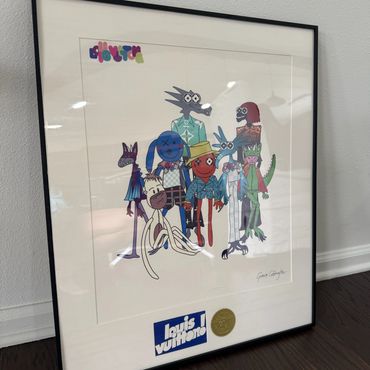 Framed Guardians of the Galaxy artwork with Louis Vuitton sticker.