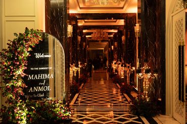 A beautiful walkway to the Sangeet with minimalist detailing yet classy