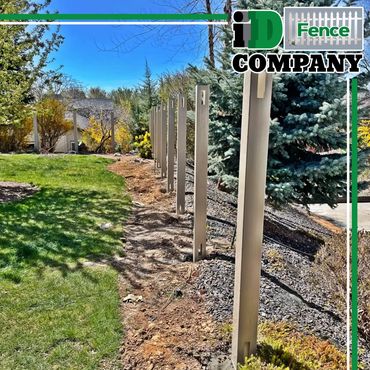 setting posts for fence. idaho fence company