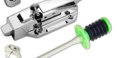 Assorted stainless steel hardware parts with keys and a tool.