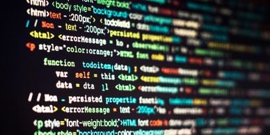 Close-up of colorful programming code on a computer screen.
