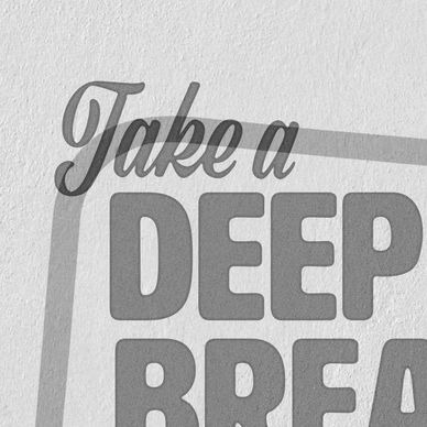 a corner of a poster that says "Take a deep breath"