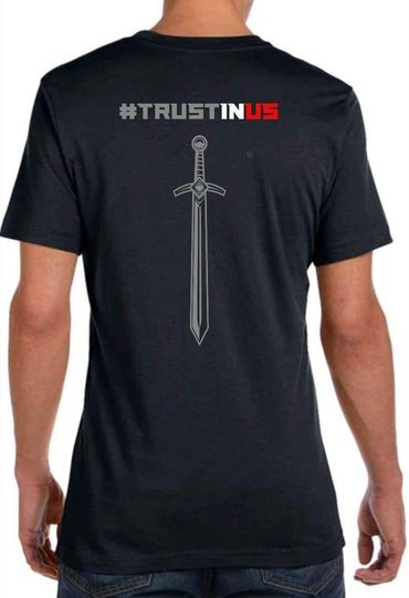 Black Knights t-shirt, with a sword and the words #Trust In Us on the back.