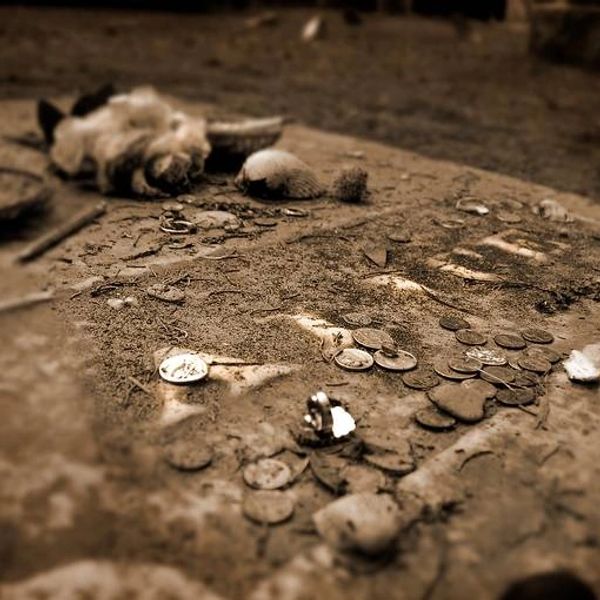 A tabletop grave with HooDoo (Gullah Magic) spell components.