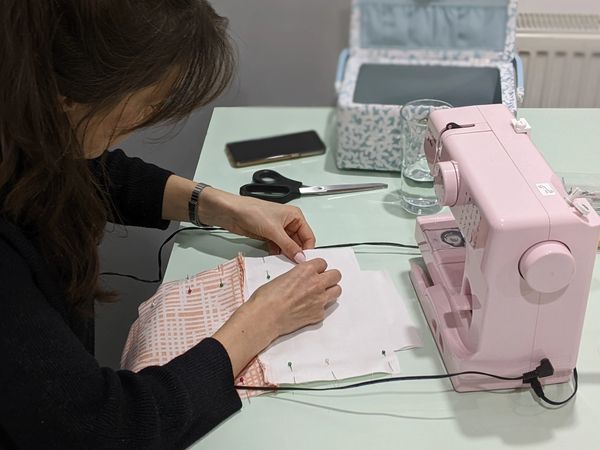 Pinning pattern pieces together in our Beginners Sewing Class
