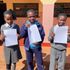 3 children holding letters