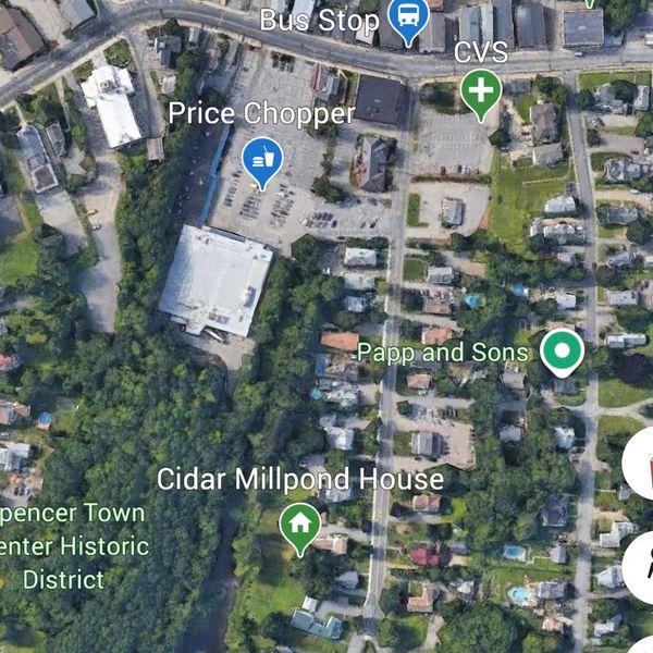 Aerial view of a town with labeled landmarks including Price Chopper and CVS.