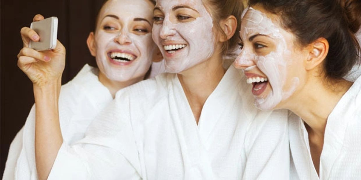 Group of women having facial at a spa day in Algarve with Heather Bain Massage Lagos 