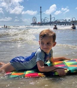 Pleasure pier, beach, family fun, boogie board.