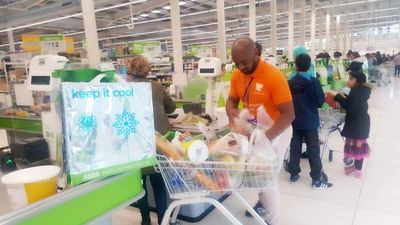 A Charity Fundraising by bag packing in Asda to provide Support for their Bereavement Services.