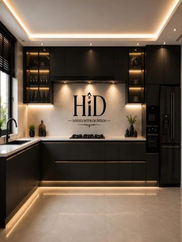 Modern kitchen with black cabinets and warm lighting.