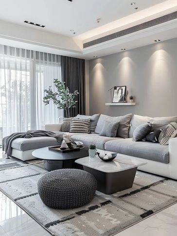 Modern living room with gray and white tones.