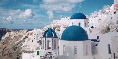 Mykonos white buildings with blue roofs