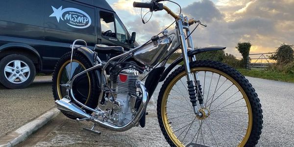 Custom polished speedway motorbike.  Every fastener, nut, bolt, bracket was mirror finished.