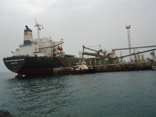 Landscape view of a ship docked at a harbor