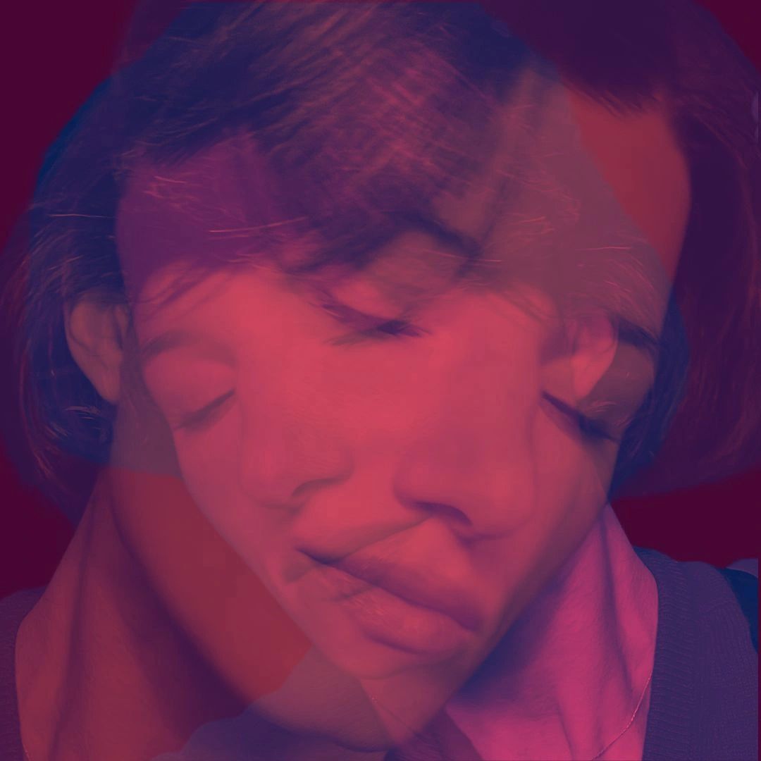 Double exposure portrait of a person with closed eyes.