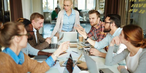 A group of people having a meeting