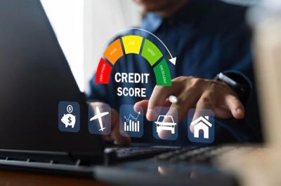 Person checking credit score on laptop.