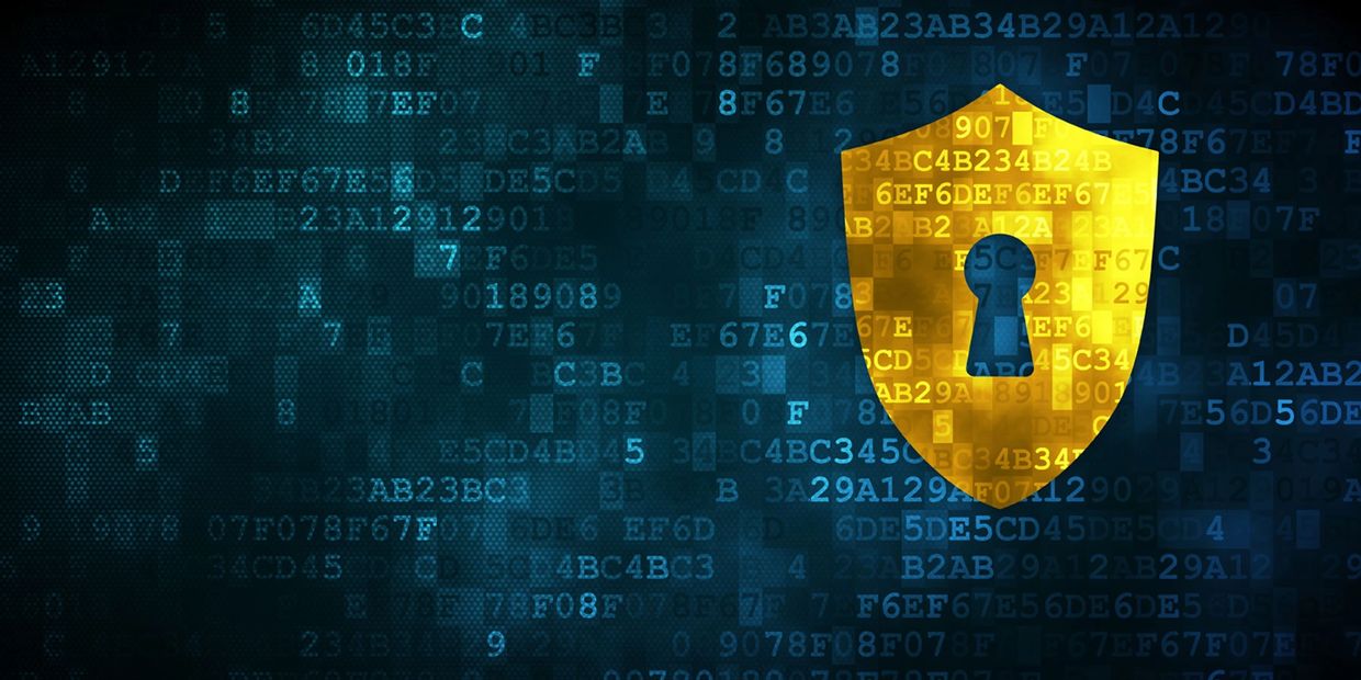 Golden security shield on digital background
