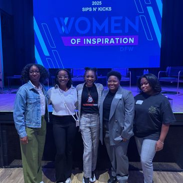 Five women at a Women of Inspiration event in 2025.