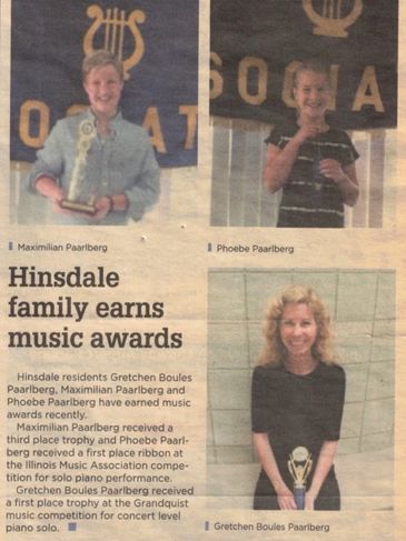 Hinsdale family wins music awards with trophies.