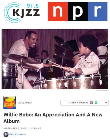 Willie Bobo teaches young child to play drums in historic music photo.