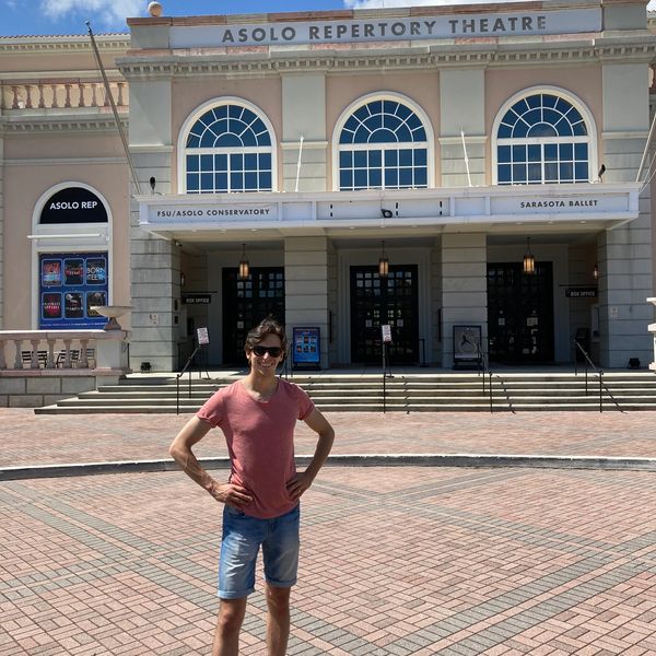Alex Hatcher standing outside the Asolo Repertory Theatre in Sarasota, Florida
