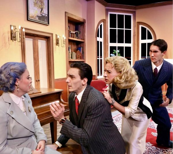 The Savage family cast on stage in the show The Curious Savage at FSU/Asolo Conservatory