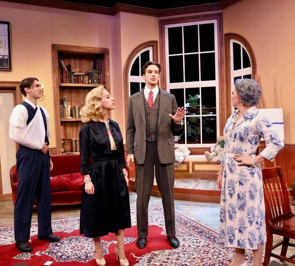 The Savage family cast on stage in the show The Curious Savage at FSU/Asolo Conservatory