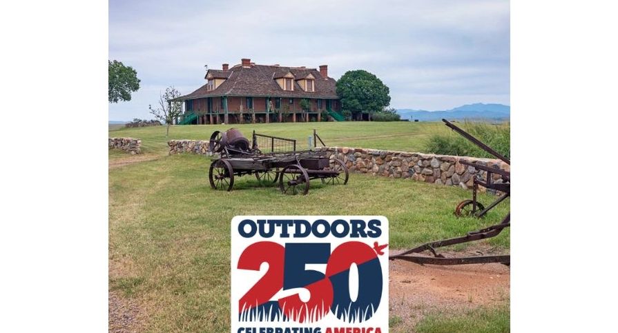 Historic house with farming equipment and Outdoors 250 celebration logo.