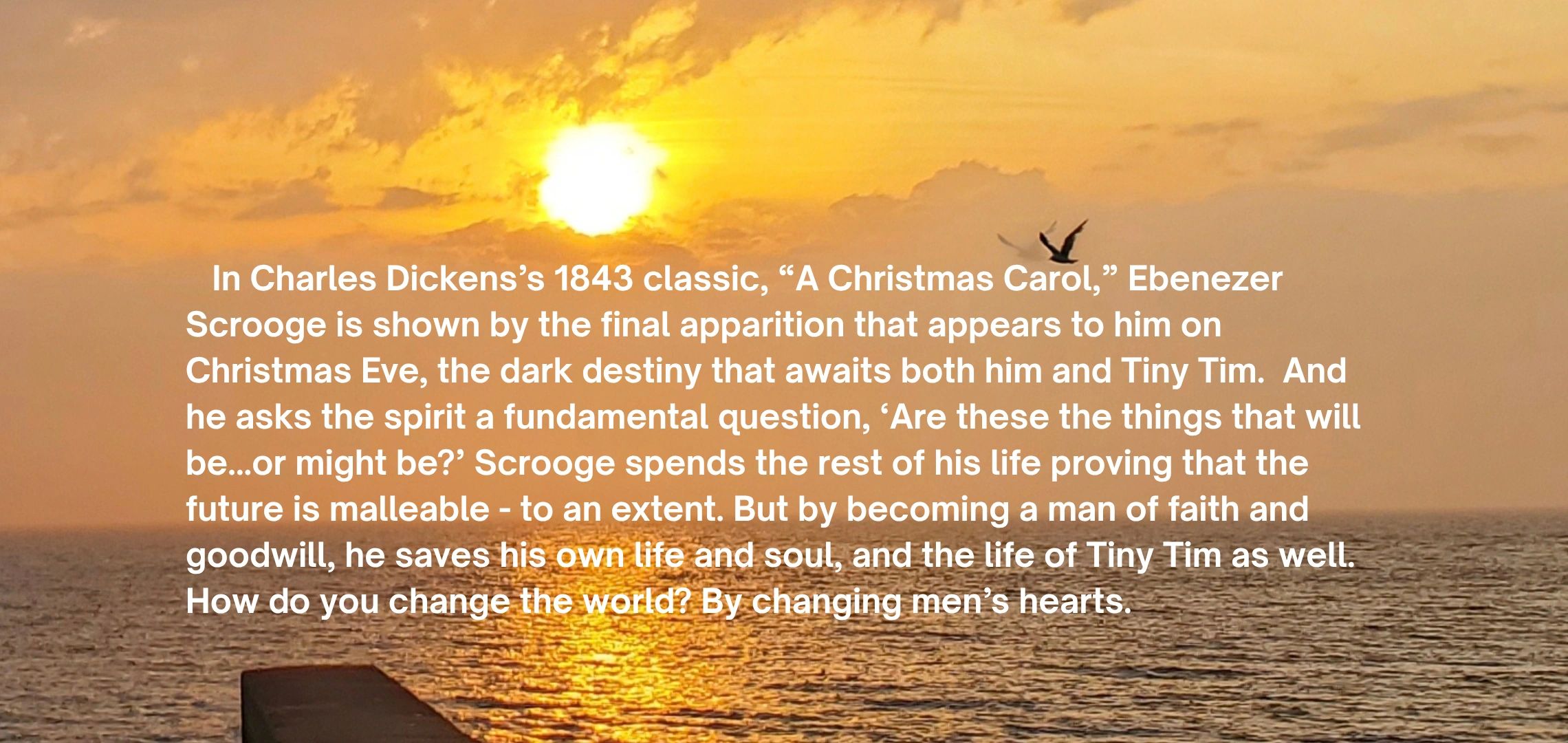 Sunset over ocean with reflection and inspirational quote about Scrooge from A Christmas Carol.