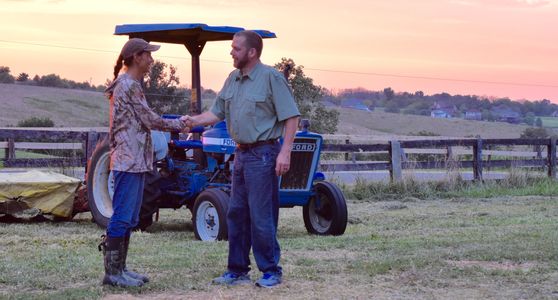 Drs Gassett and Blevins in the field to develop a wildlife management plan.