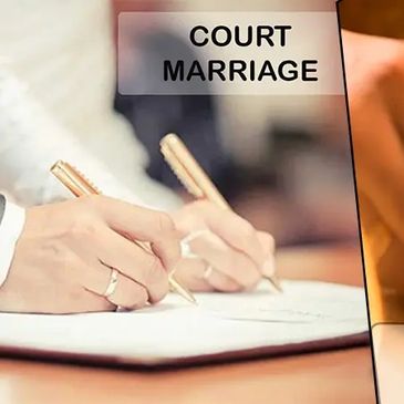 Couple signing documents for court marriage and marriage registration.