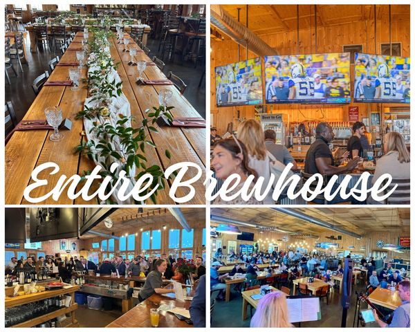 Inside a busy brewhouse with long wooden tables and a lively crowd.
