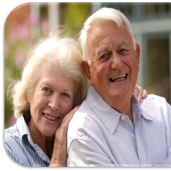 Smiling senior couple are happy with CareRite's in-home senior care services.