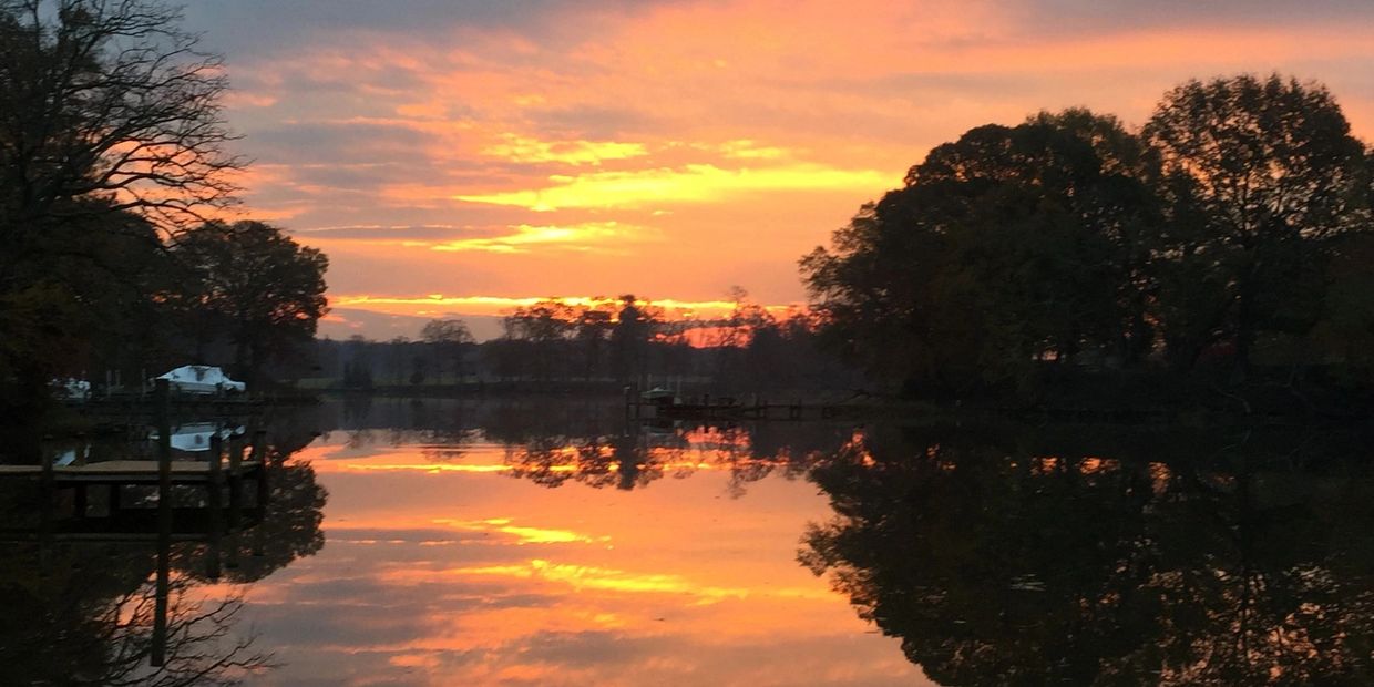 Sunrise on a river, peaceful, calm, tranquil