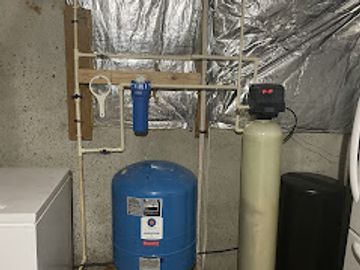 Water softener for a well with hard water