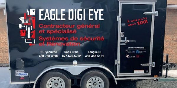 Trailer with Eagle Digi Eye security and renovation services advertisement.