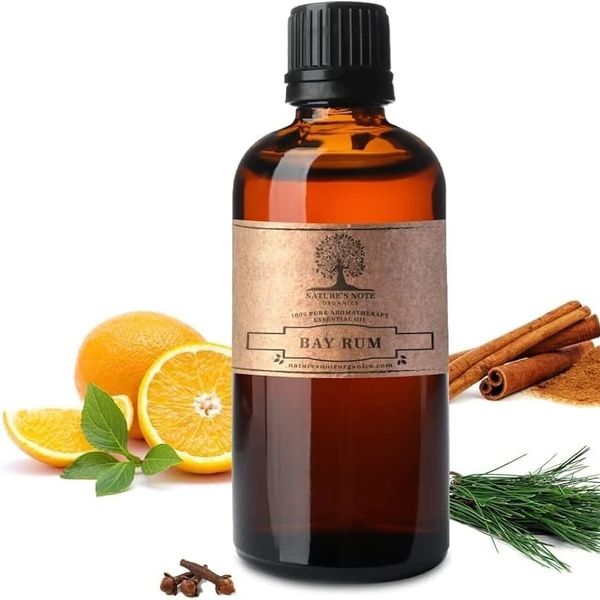 Aromatic Bay Rum essential oil bottle with herbs and citrus.