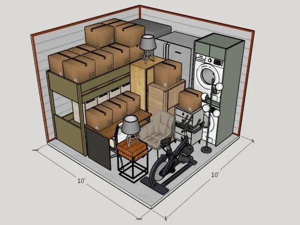 A packed 10x10 storage unit with boxes, furniture, and appliances.