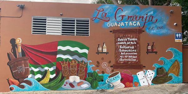 Colorful mural showcasing Puerto Rican culture and local products at La Granja Guajataca.